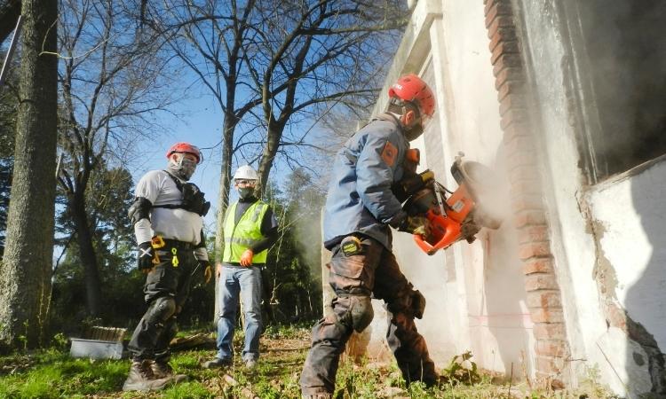 demolish a concrete wall